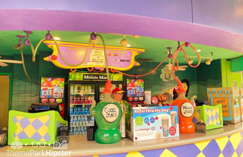 Counter at Moose Juice Stand with large Goose Juice and Moose Juice pitchers in Seuss Landing Universal Orlando Resort Islands of Adventure. Keep reading to find out what are the best Universal Orlando Snacks under $10.