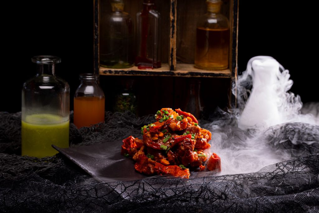 HHN 31 food 12_Spicy Fried Chicken “Offals”. Keep reading to learn about the best Universal Studios Halloween Horror Nights food and drink that you must try!