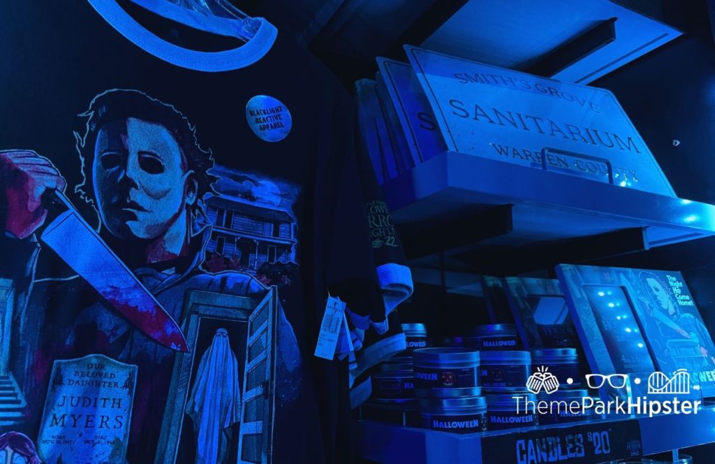 Michael Myers shirt and memorabilia items at the Tribute Store Merchandise during HHN 31 Halloween Horror Nights 2022 Universal Orlando. Keep reading to see if the Halloween Horror Nights Express Pass is worth it.  