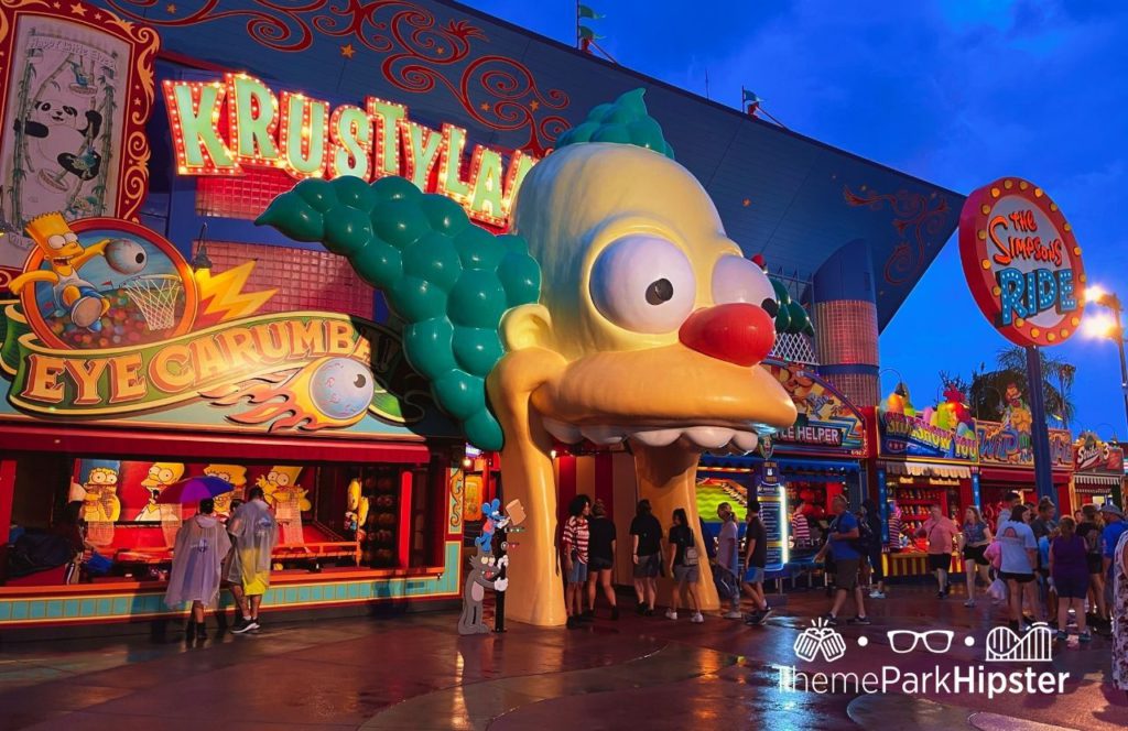 The Simpsons Ride in Springfield at Universal Studios Florida rainy night. Keep reading to discover Universal Studios outfit ideas. 