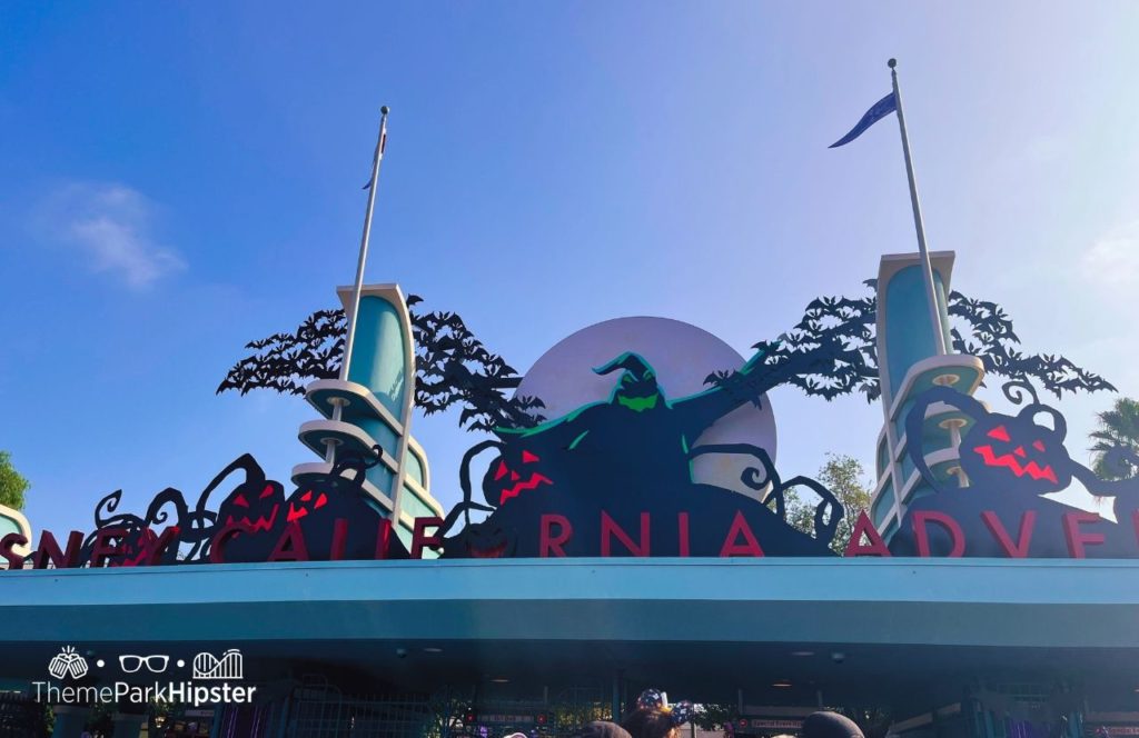 Entrance to Halloween at Disneyland and Disney California Adventure Oogie Boogie Bash Party. Keep reading to get the best days to go to Disneyland and Disney California Adventure and how to use the 2024 Disneyland Crowd Calendar.