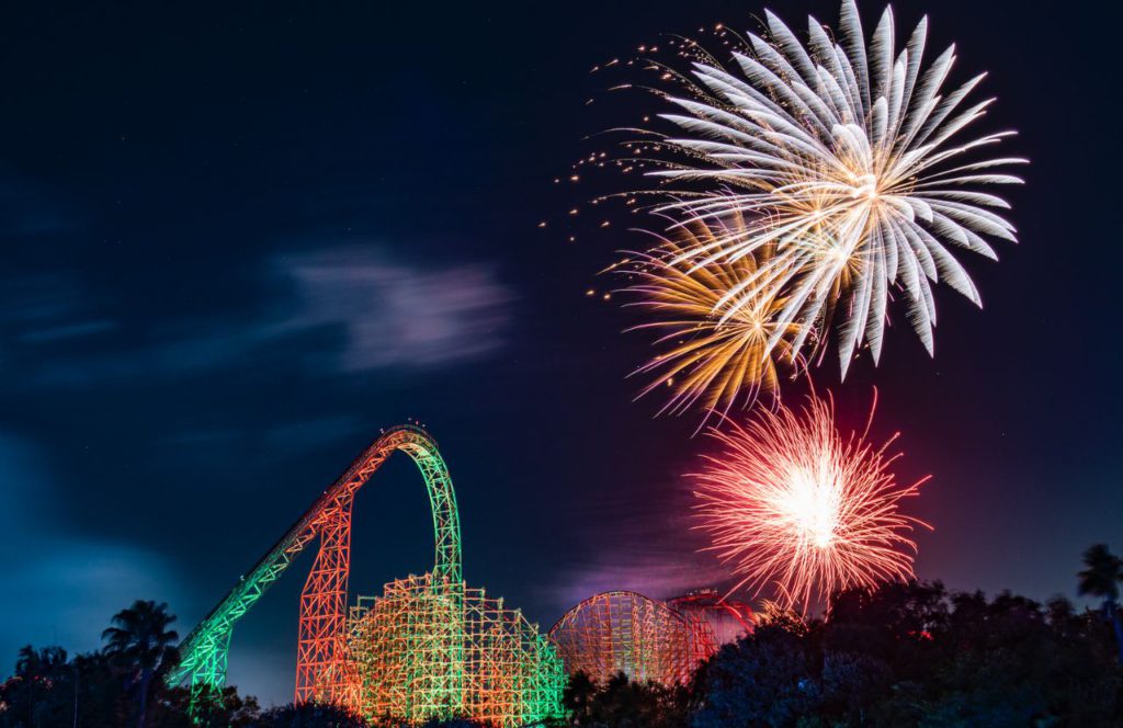 Fireworks at with Gwazi Roller Coaster in the Background Busch Gardens Christmas Town. Keep reading to get the full guide on doing Christmas at Busch Gardens Tampa!