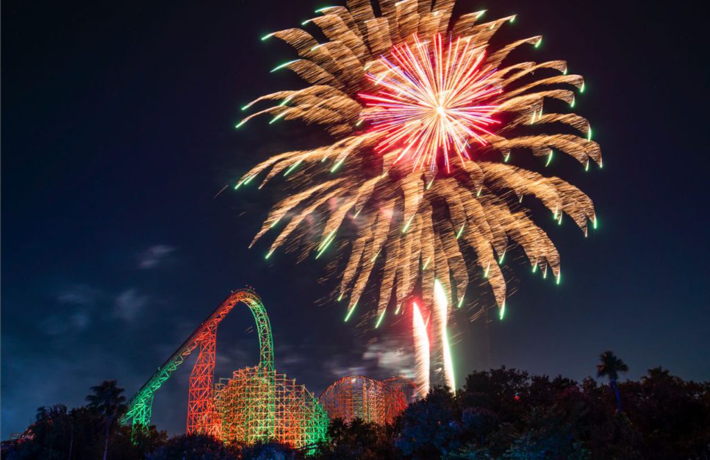 Gwazi next to Fireworks at Busch Gardens Christmas Town. eep reading to learn about doing Thanksgiving Day at Busch Gardens Tampa Bay!