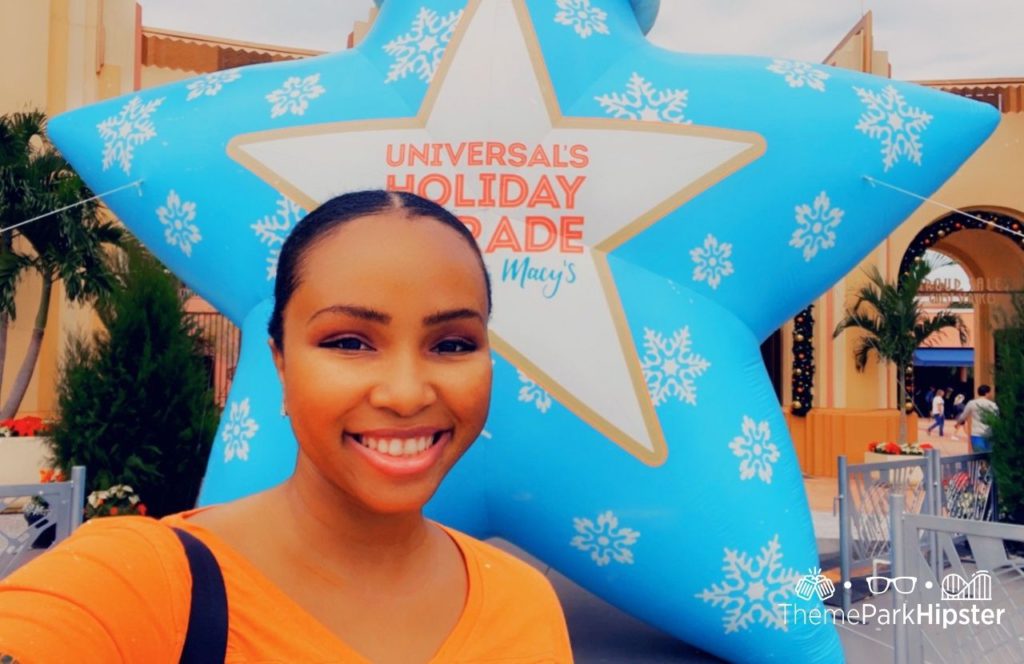 NikkyJ in front Christmas at Universal Studios in Universal Orlando Resort