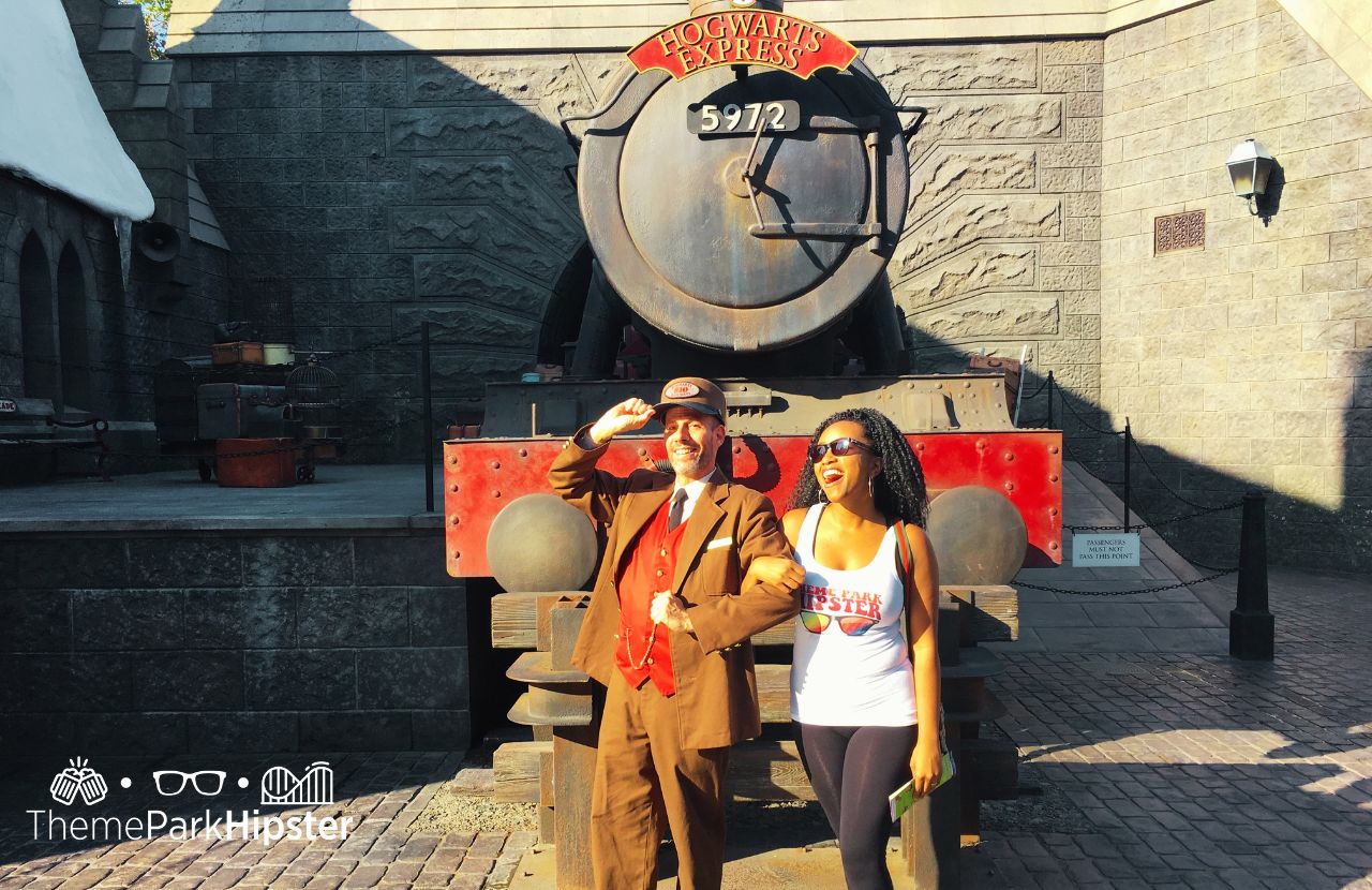 NikkyJ in front of Hogwarts Express Harry Potter World Universal Studios Hollywood California
