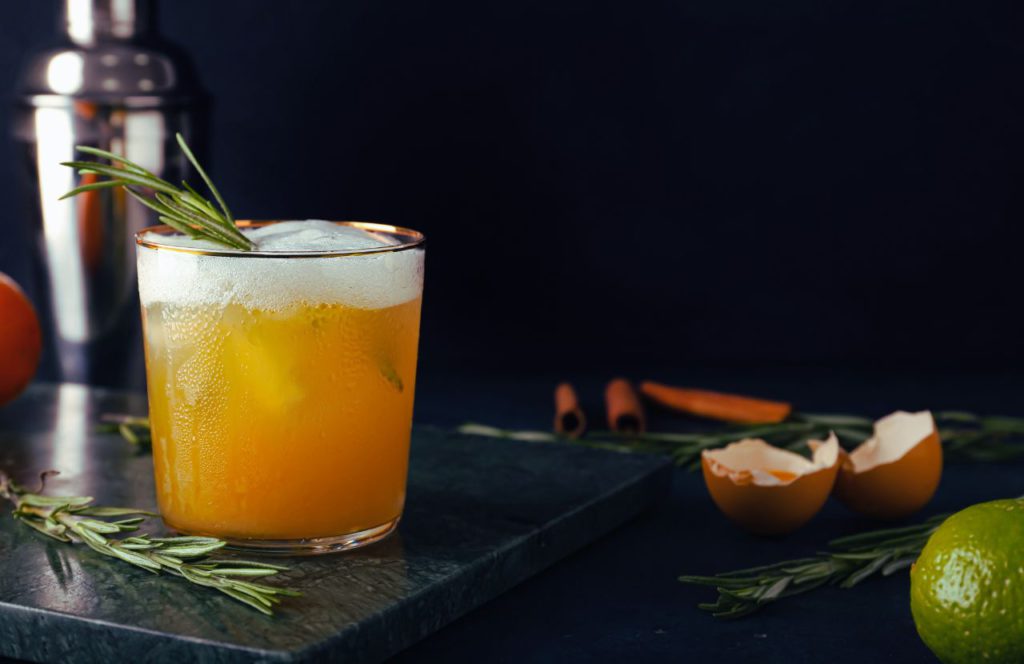 Rosemary and Maple Whiskey Sour at Raglan Road in Disney Springs. Keep reading to get the best drinks at Disney Springs and the best adult beverages at Walt Disney World!