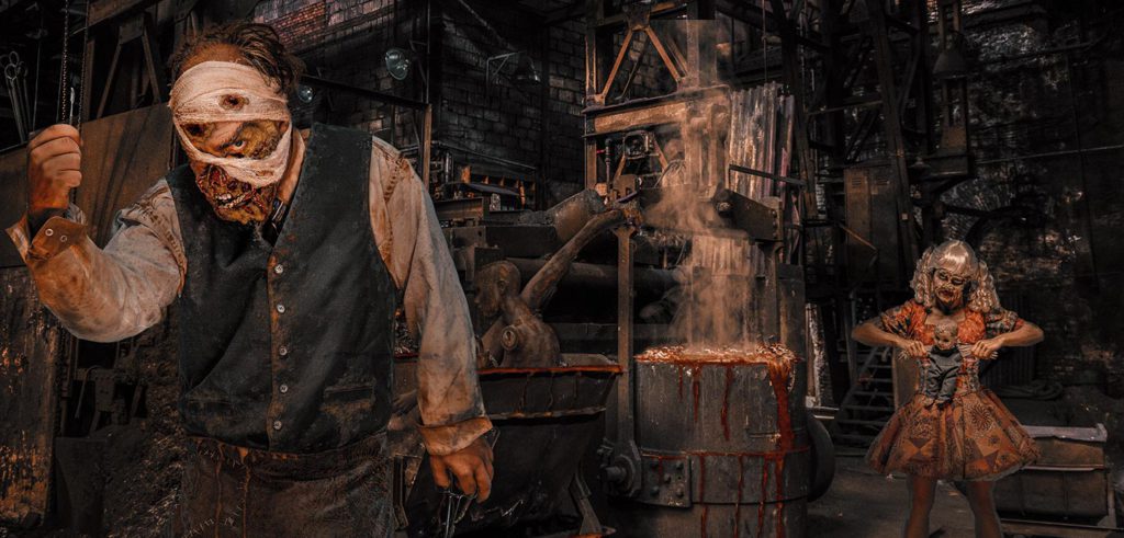 Wax Works Haunted House at Knott's Scary Farm with a scare actor covered in old clothing and bloody bandages and zombie like skin in front of abandoned like machinery. Keep reading to find out all you need to know about Knott’s Scary Farm houses.