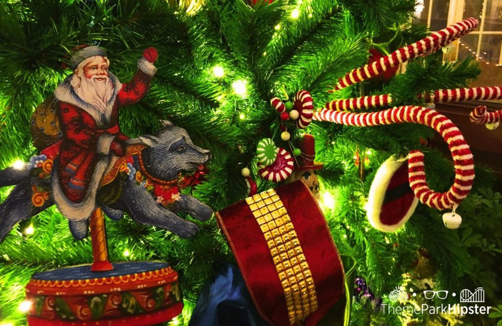 Disney Boardwalk Inn Christmas Tree Ornaments with Santa Claus. One of the best things to Do at Disney World for Christmas. Keep reading to learn about the best Disney Christmas trees!