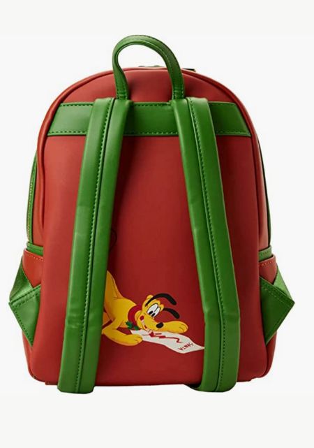 Pluto looking at Santa List on Red Loungefly Disney Mickey and Minnie House Hot Cocoa Fireplace Double Strap Shoulder Bag. One of the best Disney Christmas Loungefly bags.