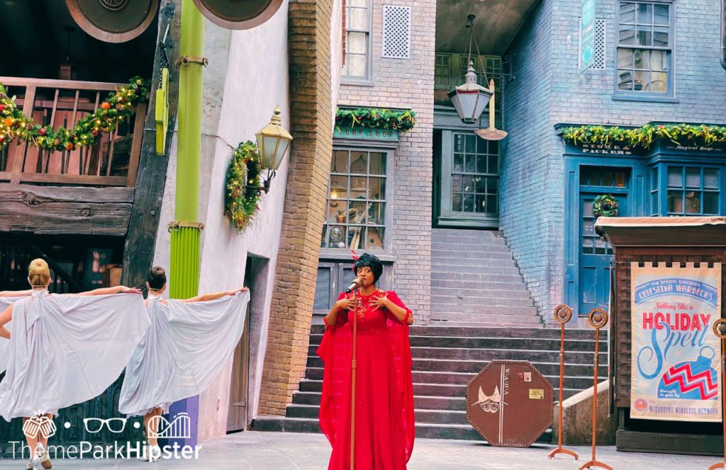 Celestina Warbeck and her banshees sing holiday songs in Diagon Alley for Christmas at Wizarding World of Harry Potter