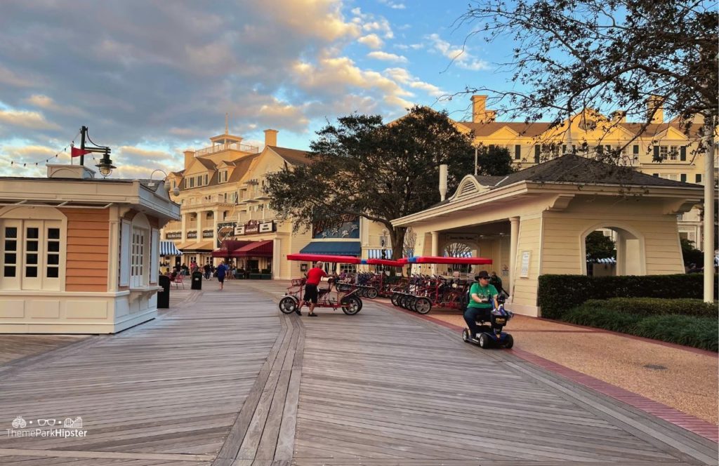 Christmas at Disney Boardwalk Inn and Villas grand view with Surrey Bike Rental. One of the best things to do at Disney World for Valentine's Day.