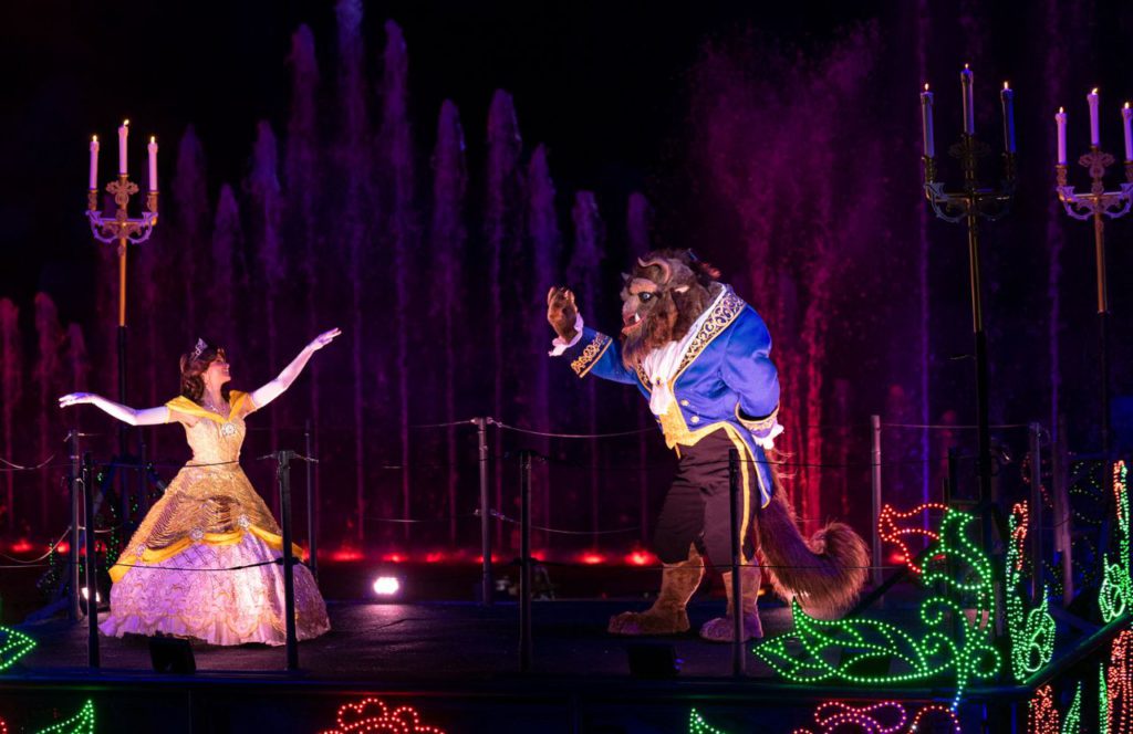 Belle and Beast float across the water as the air fills with love and romance when Fantasmic! at Disney's Hollywood Studios