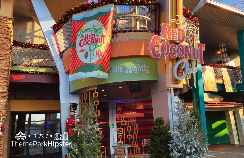 Universal Orlando Resort Red Coconut Club at Christmas in Citywalk. Keep reading to get the best things to do at Universal Orlando solo trip while going to Universal alone.