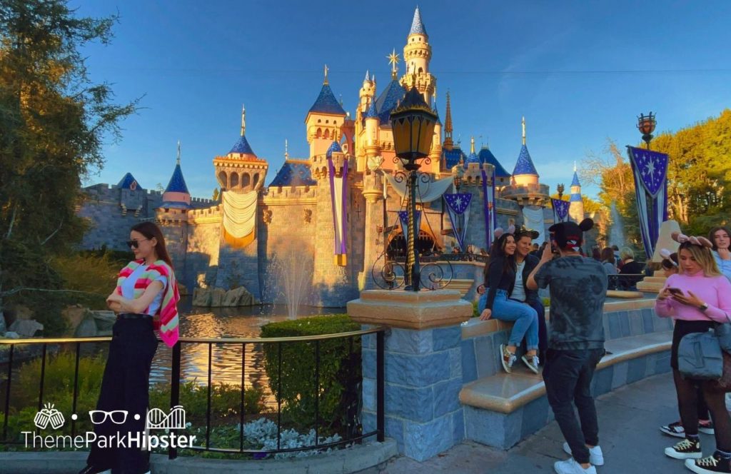 Disneyland Resort Sleeping Beauty Castle in California. Keep reading to get the full guide on which is better Universal Studios Hollywood vs Disneyland.
