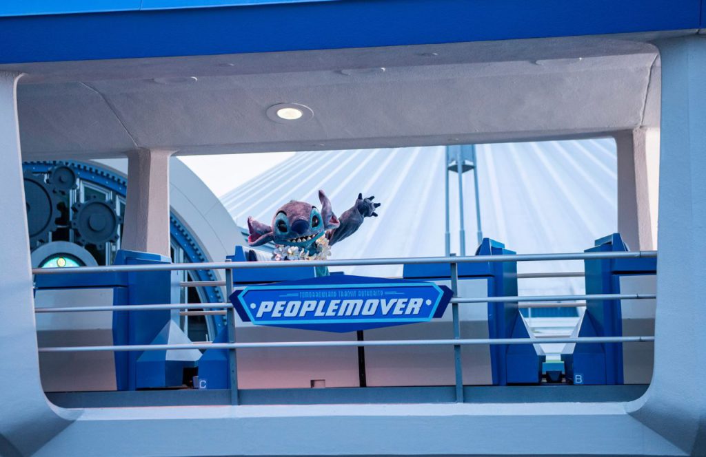 Stitch from Lilo and Stitch on the People Mover at Magic Kingdom in Walt Disney World Resort. Keep reading to get the best Valentine's Day movies on Disney Plus.