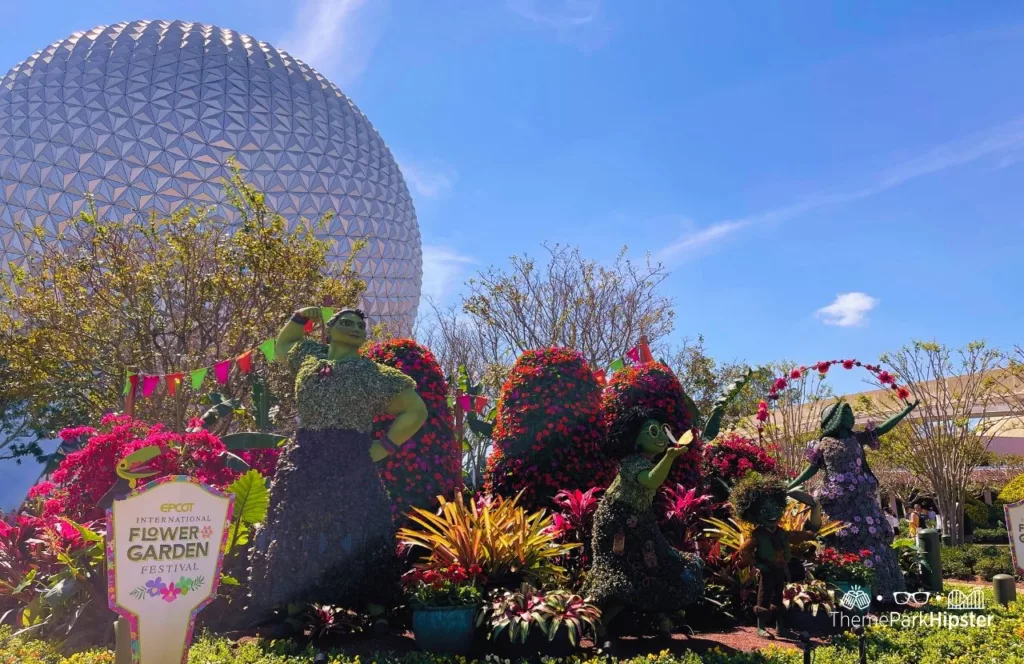 Epcot Flower and Garden Festival 2024 Encanto Topiary at the Entrance near Spaceship Earth. Keep reading to see what is new for the Epcot Flower and Garden Festival.