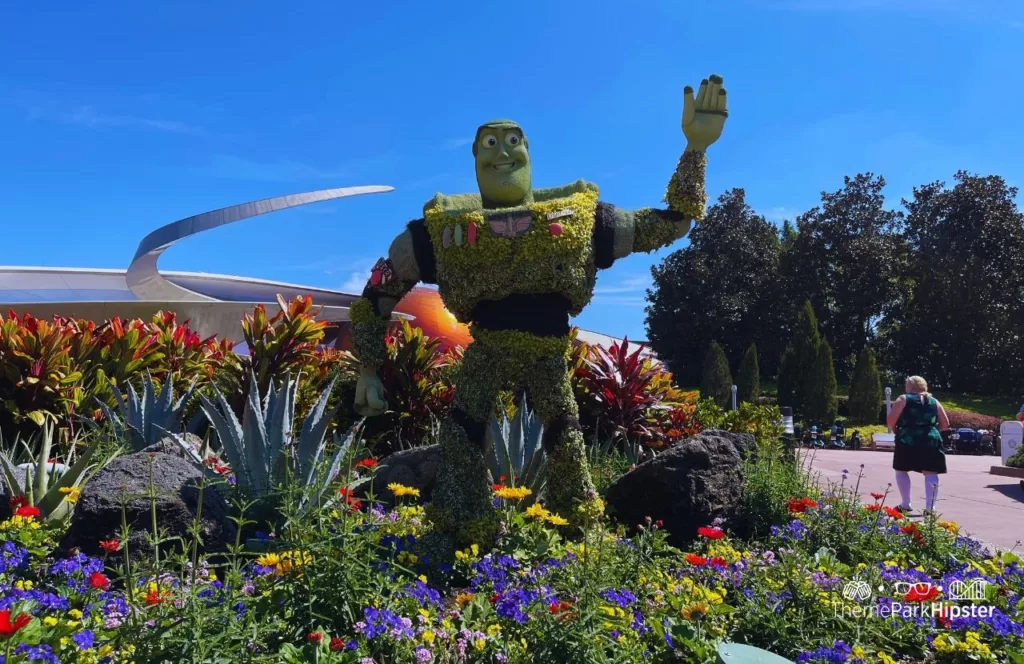 Epcot Flower and Garden Festival 2023 Mission Space with Buzz Lightyear Topiary. One of the best Epcot Festivals at Disney World!