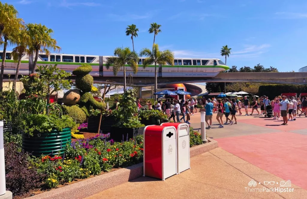 Epcot Flower and Garden Festival itinerary 2025 topiary with monorail going by
