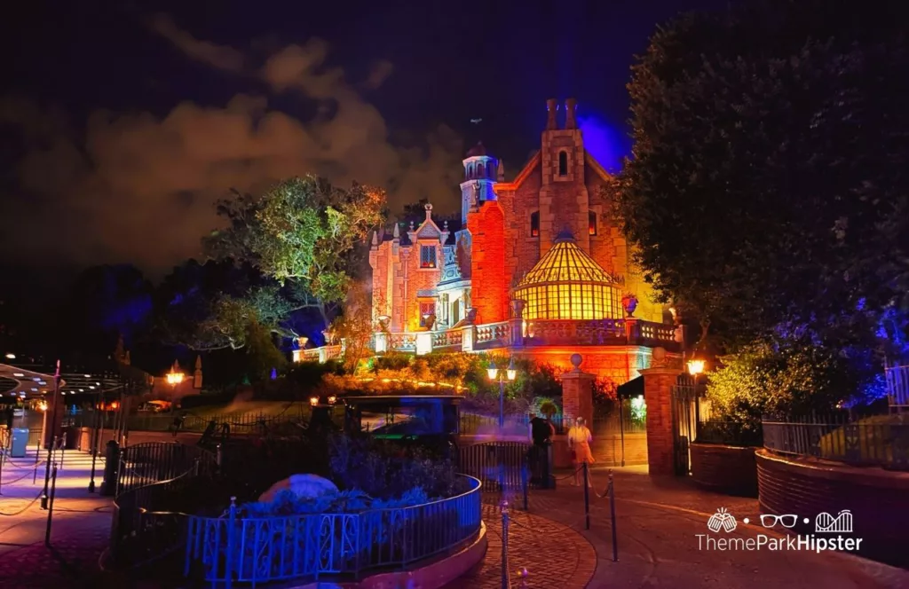 Mickey's Not So Scary Halloween Party at Disney's Magic Kingdom Theme Park Haunted Mansion View at Night. Keep reading to get the best rides at Magic Kingdom for Genie Plus and Disney Lightning Lane.