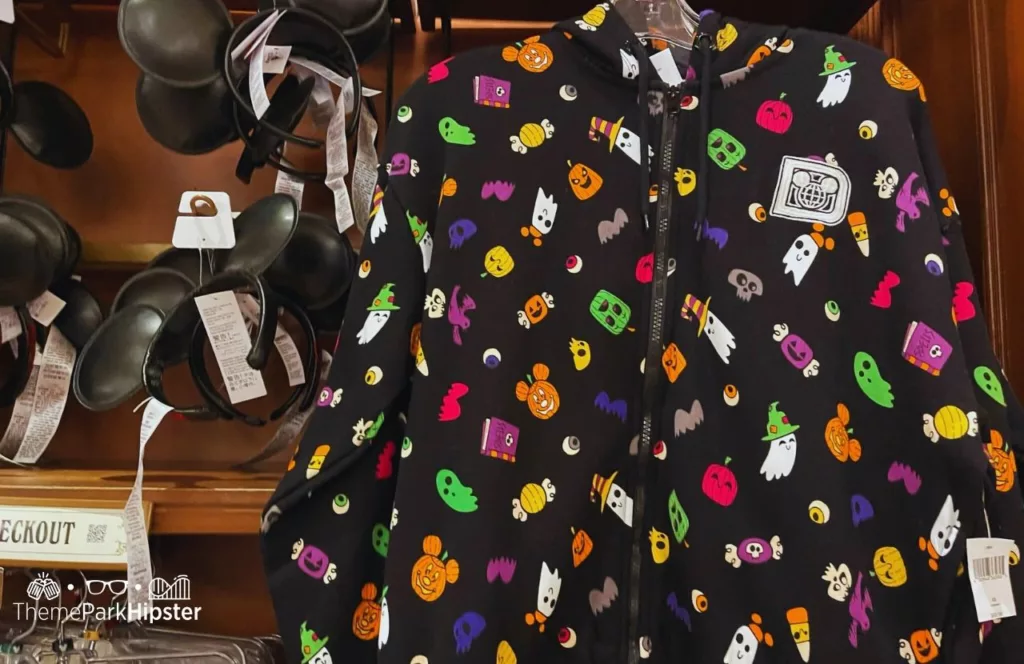 Mickey's Not So Scary Halloween Party at Disney's Magic Kingdom Theme Park Merchandise Black Mickey Mouse Ears and Black Sweater Jacket. Keep reading to know what to pack and what to wear to Disney World in October for your packing list.