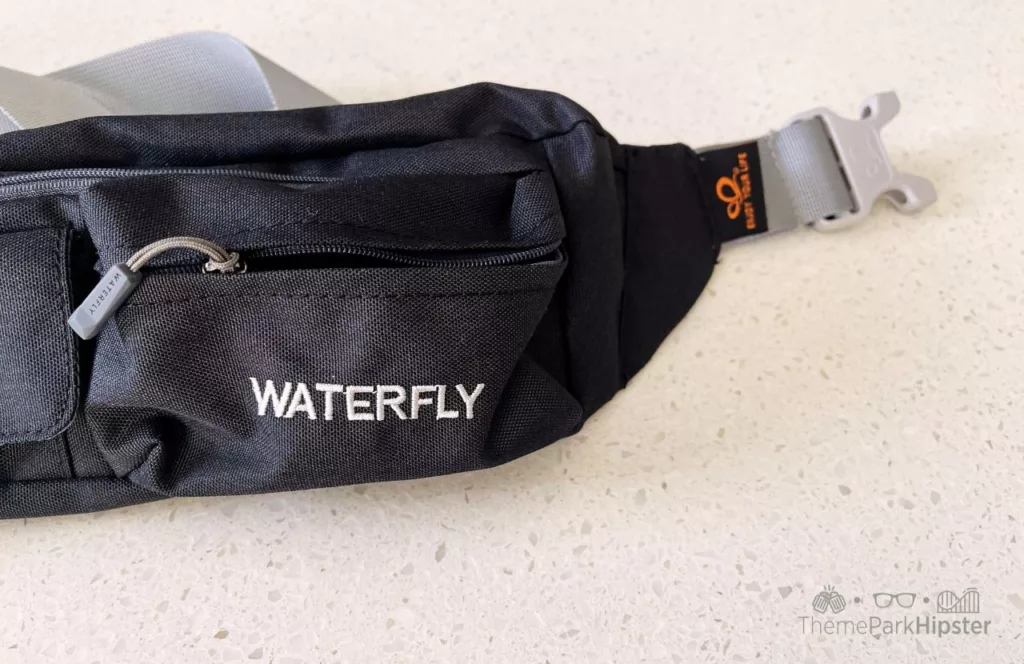 One of the best fanny packs for Disney World is Waterfly gray waist pack.
