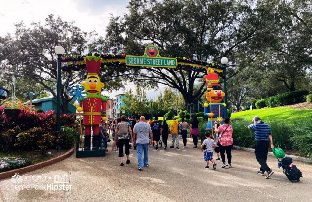 SeaWorld Orlando Resort Christmas Celebration Sesame Street Land Entrance. Keep reading to learn how to avoid with SeaWorld wait times with quick queue skip the line pass.