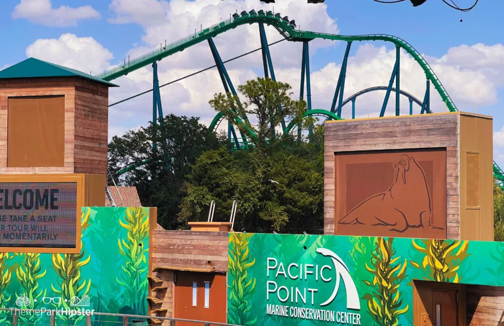 SeaWorld Orlando Resort Sea Lion and Otter Show at Pacific Point with Kraken roller coaster in the background.