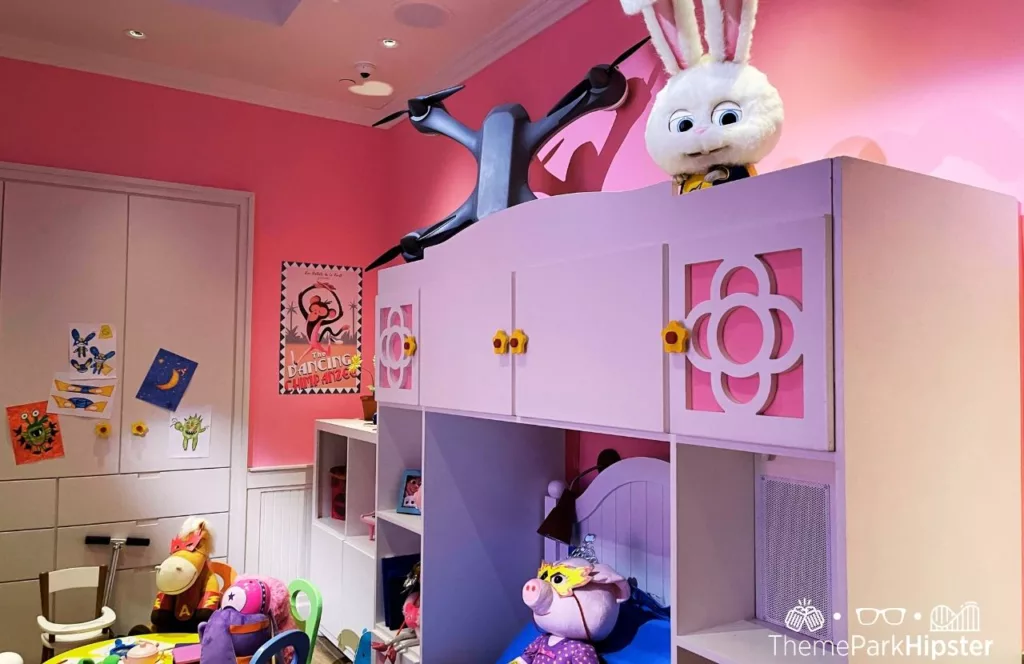 Universal Studios Hollywood Secret Life of Pets Ride rabbit in pink room. Keep reading to find out more of the best Universal Studios Hollywood attractions for solo travelers.