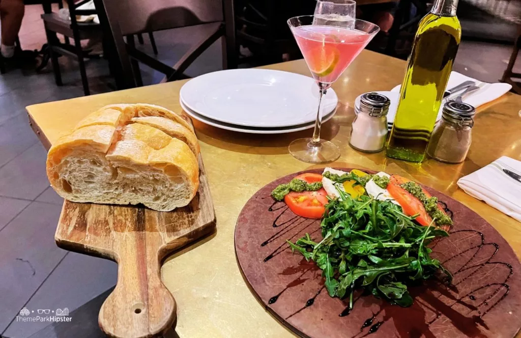 Universal Orlando Resort Vivo Italian Kitchen Restaurant in CityWalk Bread Cosmo and Caprese Salad. One of the best things to eat at Universal Studios.