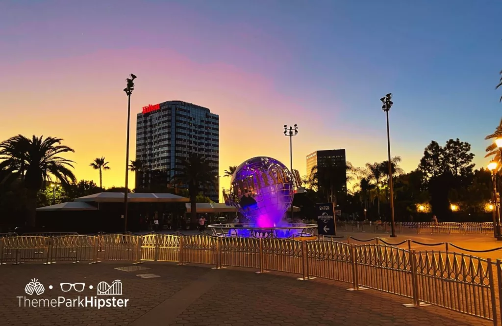 Universal Studios Hollywood Hilton Hotel and Globe at sunset. Keep reading to get the full travel guide to 4th of July at Universal Studios Hollywood.