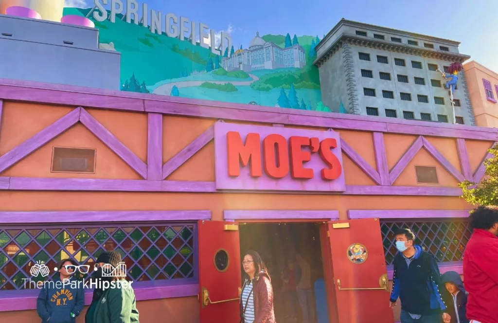 Universal Studios Hollywood Springfield Simpsons Land Moe's Tavern. Keep reading to get the best photos at Moe's Tavern Universal Studios and the menu.
