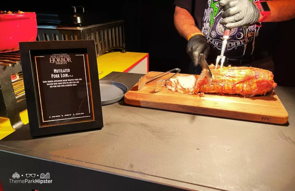 Universal Orlando Resort Halloween Horror Nights a Taste of Terror HHN Food Multilated Pork Loin with Vegetable Medley. Keep reading to learn about the best Universal Studios Halloween Horror Nights food and drink that you must try!