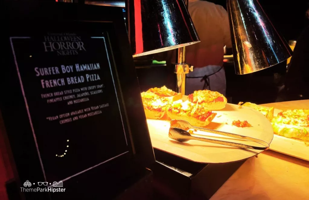 Universal Orlando Resort Halloween Horror Nights a Taste of Terror HHN Food Surfer Boy Hawaiian French Bread Pizza. Keep reading to learn about the best Universal Studios Halloween Horror Nights food and drink that you must try!