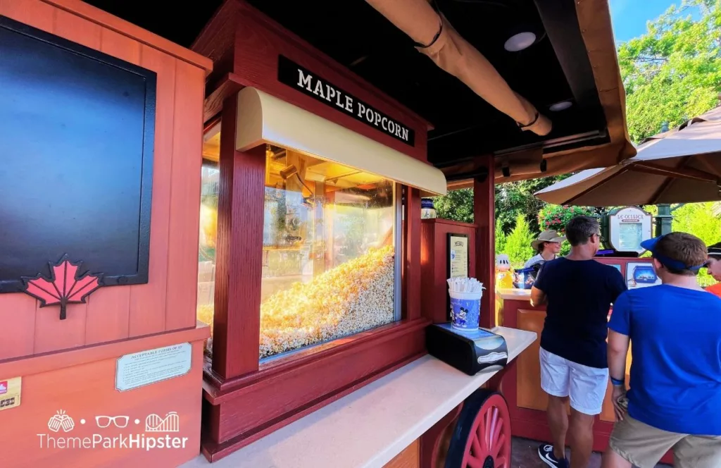 2023 Epcot Food and Wine Festival at Disney Canada Pavilion Maple Popcorn Bucket and Ottawa Apple menu. One of the best snacks at EPCOT. 
