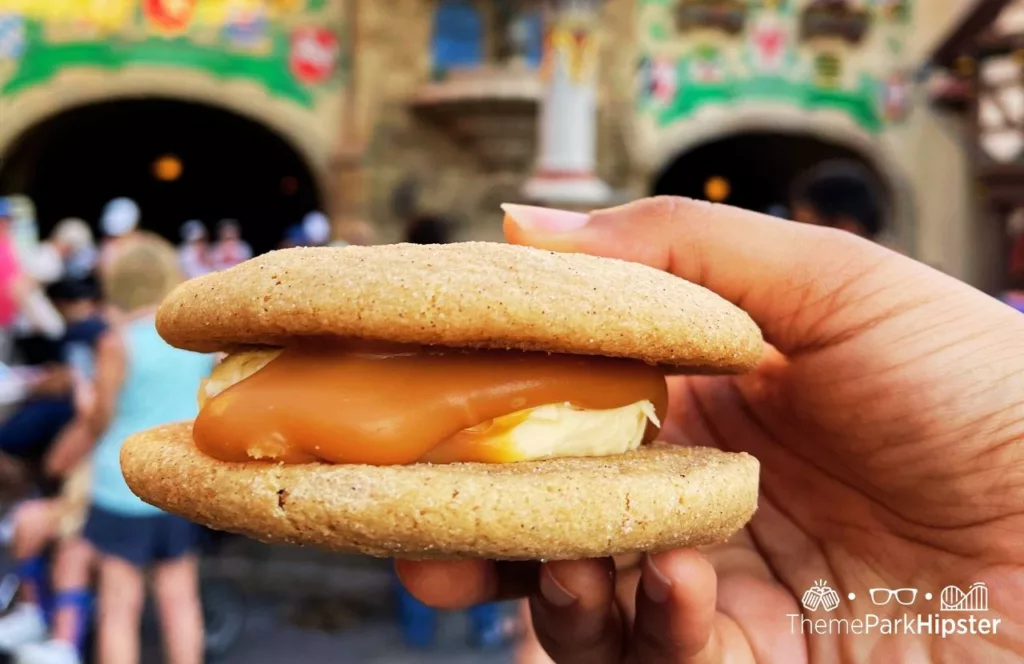 2023 Epcot Food and Wine Festival at Disney Germany Pavilion Karamell Kuche Wether's Sweet Shop Snickerdoodle Sandwich. One of the best snacks at EPCOT.