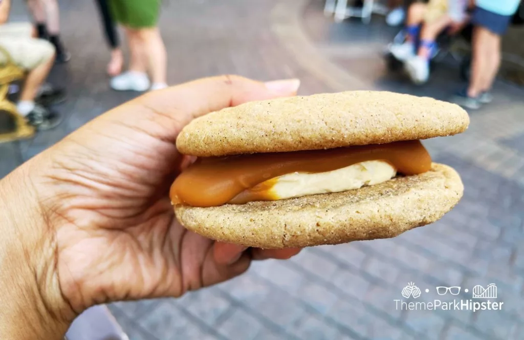 2023 Epcot Food and Wine Festival at Disney Germany Pavilion Karamell Kuche Wether's Sweet Shop Snickerdoodle Sandwich. One of the best snacks at EPCOT.