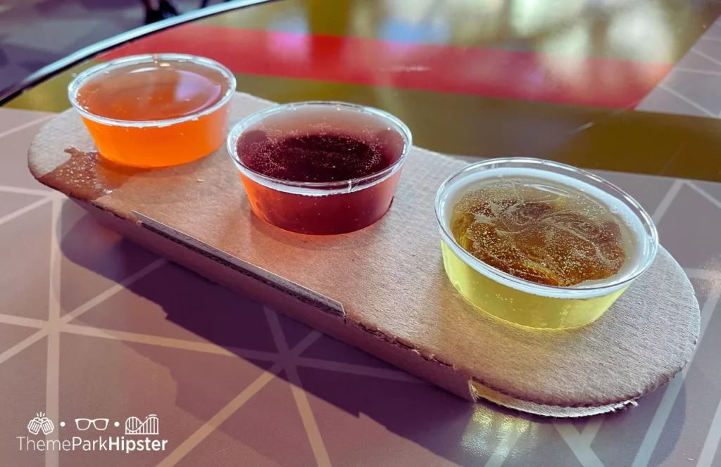 2024 Epcot Food and Wine Festival at Disney Odyssey Cider Flight. Keep reading to get the Do’s and Don’ts of Drinking Around the World at Epcot Tips.