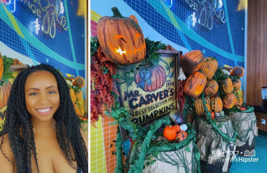 NikkyJ at Cabana Bay Beach Resort's Swizzle Lounge at Universal Orlando Halloween Horror Nights 2023 Bar with a spooky festive display of pumpkins and decor. Keep reading to find out more about Halloween at Universal. 