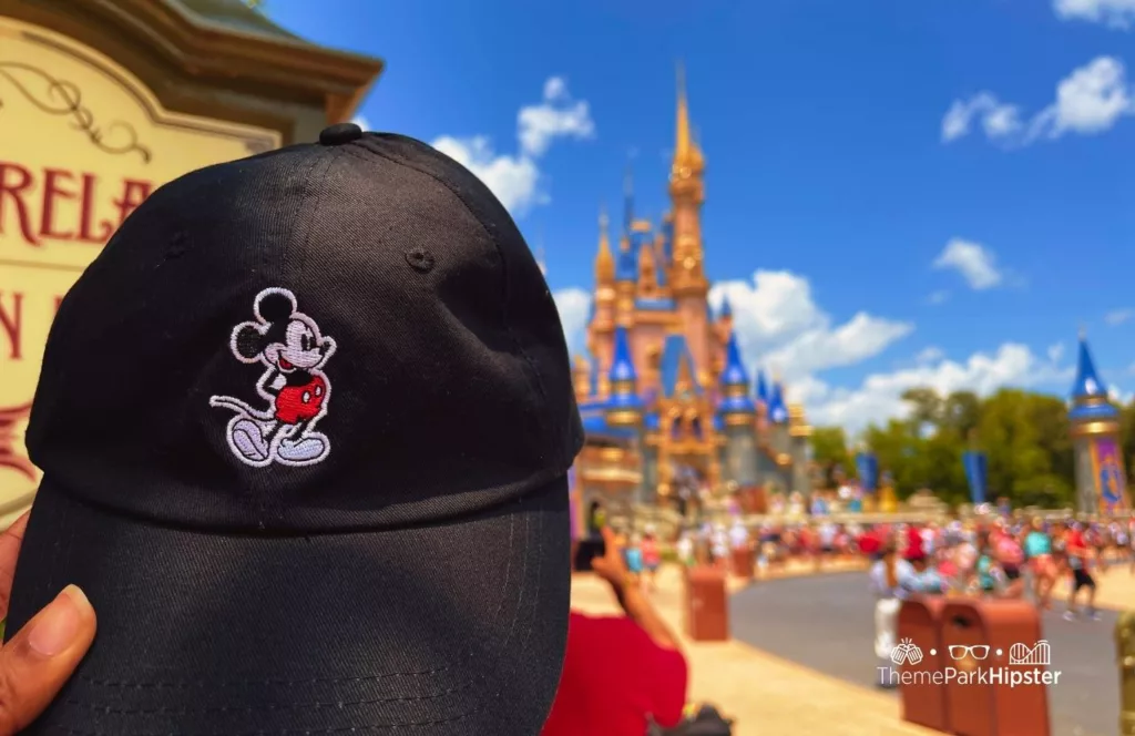 Disney Cinderella Castle and Mickey Mouse Hat at Magic Kingdom Theme Park. One of the best Disney Christmas gifts!