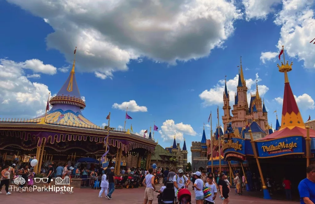 Disney Magic Kingdom Theme Park Fantasyland Carousel Ride and Cinderella Castle. Keep reading to get the best rides at Disney World for adults.