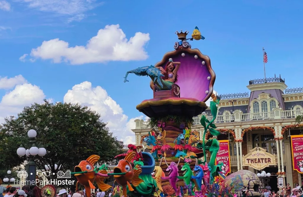 Disney Magic Kingdom Theme Park Festival of Fantasy Parade Little Mermaid Ariel. Keep reading to learn the difference between alone vs lonely and how to have the perfect solo Disney World trip.