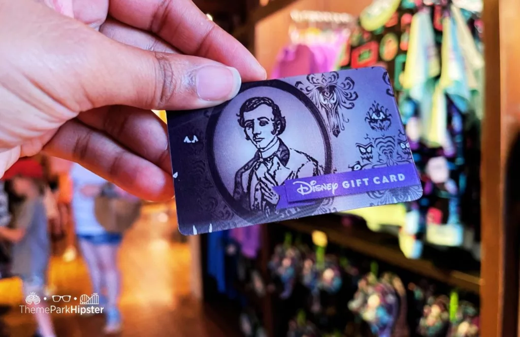 Disney Memento Mori Store Haunted Mansion Merchandise at Magic Kingdom Theme Park Master Grady Gift Card