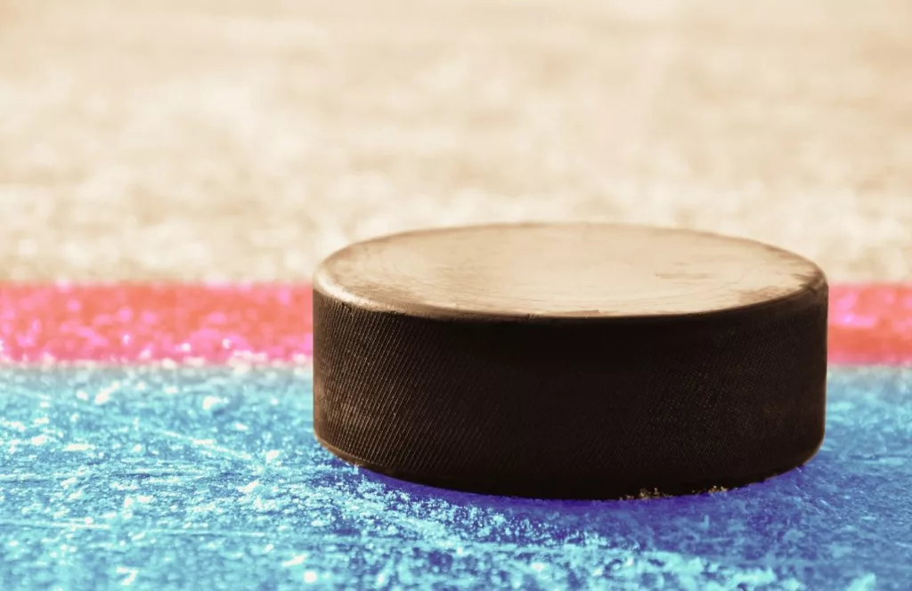 Hockey puck on the ice at Hershey Bears Hockey at Giant Center. Keep reading to learn more about all the things to do around Hersheypark.