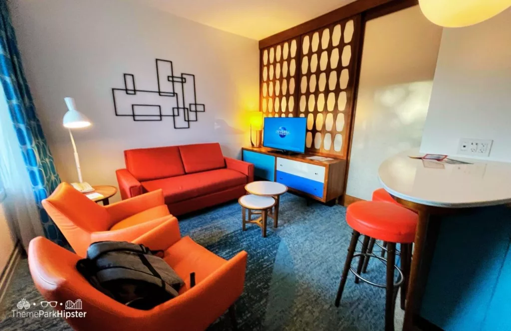 Retro style living room in hotel room Cabana Bay Beach Resort Hotel at Universal Orlando. Keep reading discover more about the best hotels near Halloween Horror Nights.