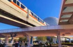 Disney Monorail Transportation at Epcot passing by entrance and Spaceship Earth. One of the Epcot Rides.