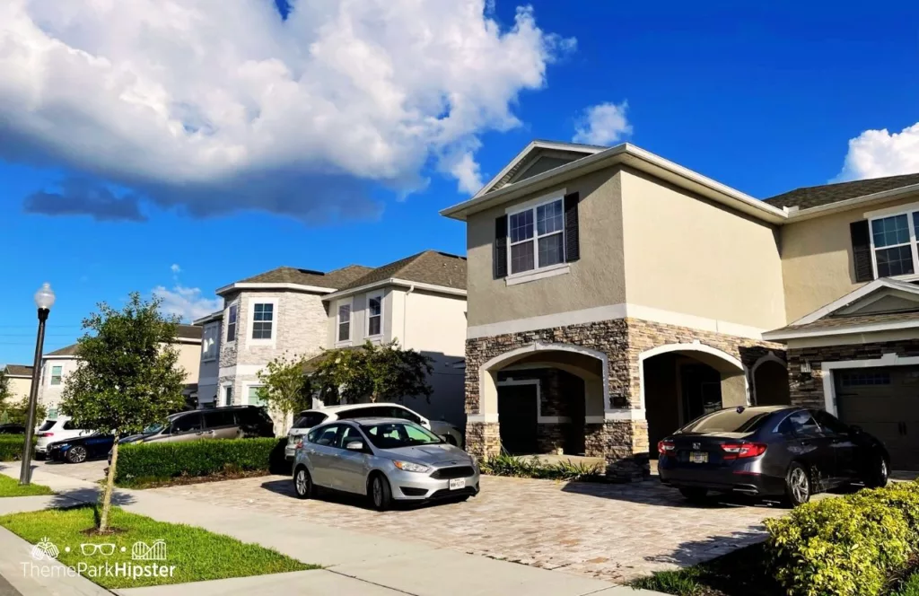 Encore Resort homes with car parked in their private driveways. Keep reading to hear more about Encore Resort at Reunion. 