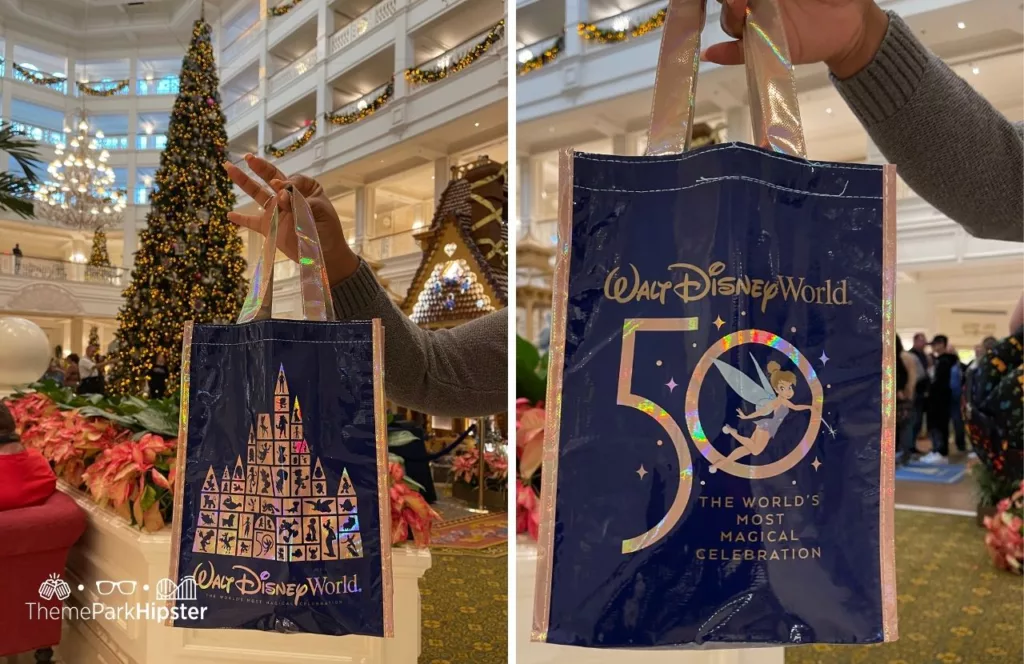 Free Recyclable Reusable Shopping Bag at Disney Grand Floridian Resort and Spa at Christmas one of the best souvenirs at Disney World. Keep reading to learn more about the perks of a Disney Annual Pass.  