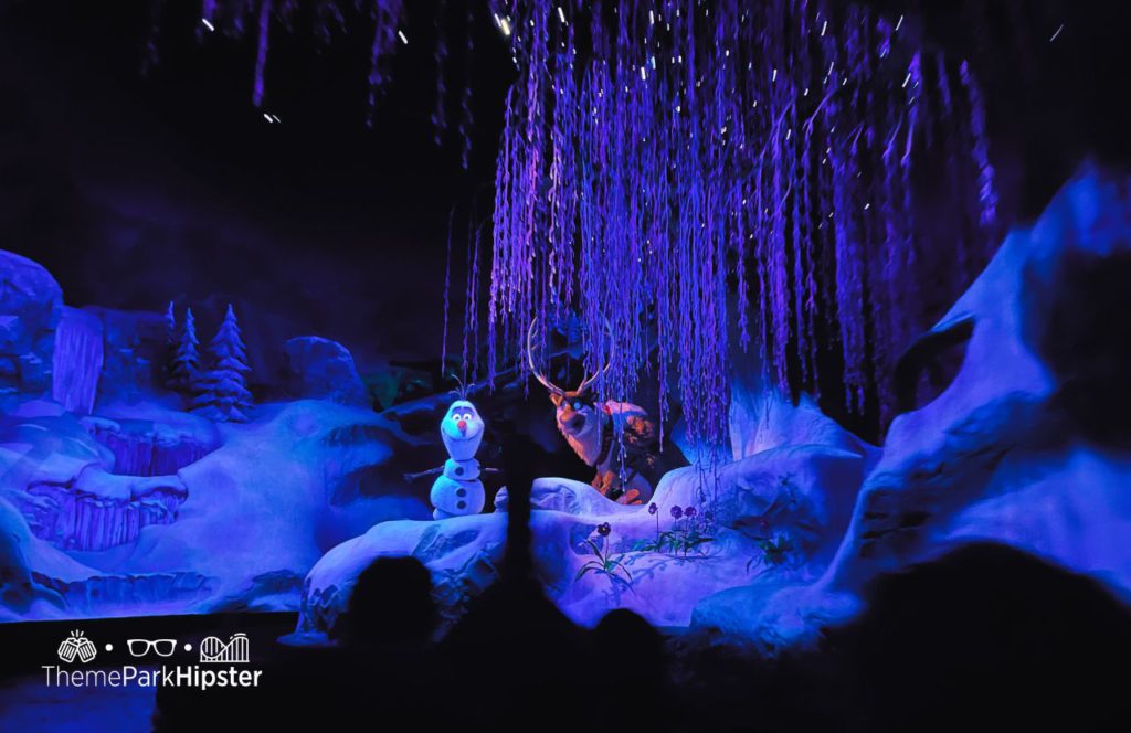 Olaf and Sven on Frozen Ever Ride at Epcot in Norway Pavilion Disney World. Keep reading to get the best time to visit Disney World. 