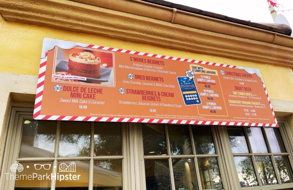 One of the best things to eat at SeaWorld Orlando Christmas Celebration Tis the Season Food Beignets Menu with Dulce de leche cake smores beignets oreo