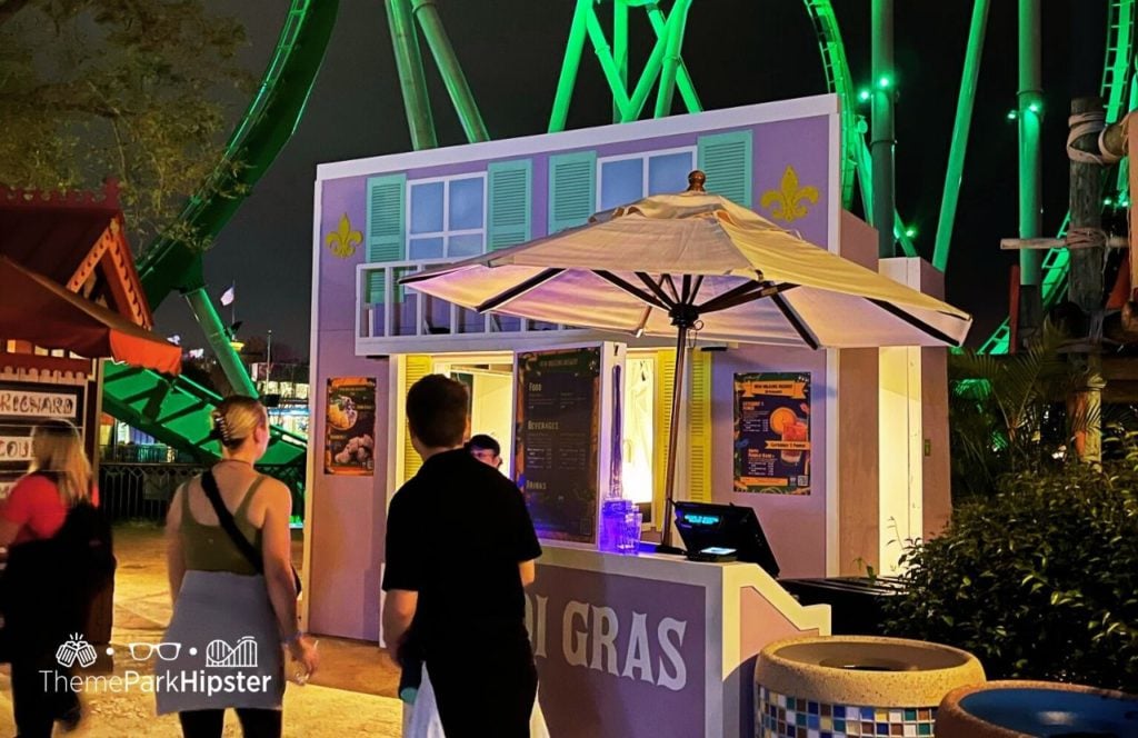 Mardi Gras at Universal Islands of Adventure Food Booth. Keep reading for all you need to know about Universal Orlando Mardi Gras food menu.